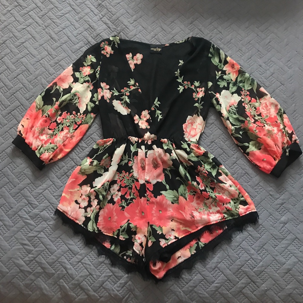 Boutique purchases floral romper.